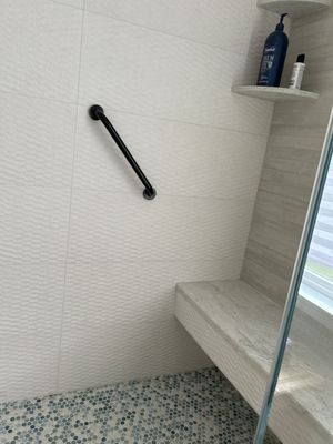 Bench in shower.