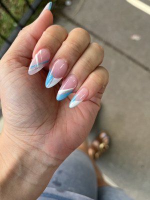 Nails by T. The shape is perfect and the designs are so beautiful.