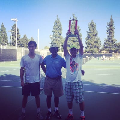 Julian Svitolin, my husband and a coach winning an open devision tournament ! Congratulations !