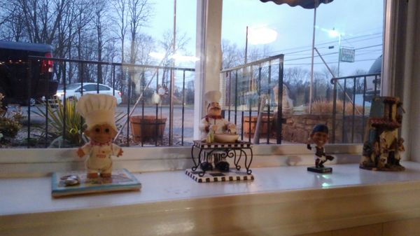 Cute Italian figurines on the windowsill