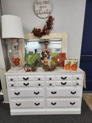 Love this chest of drawers with it's clean white finish and beautiful hand picked knobs.