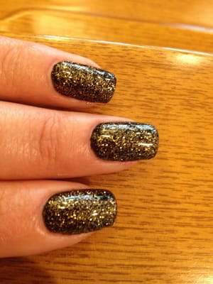 LOVE, LOVE, LOVE the new holiday Shellac colors! Trying the gold glitter on black this trip.