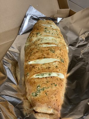 Cheesesteak roll with garlic knot crust