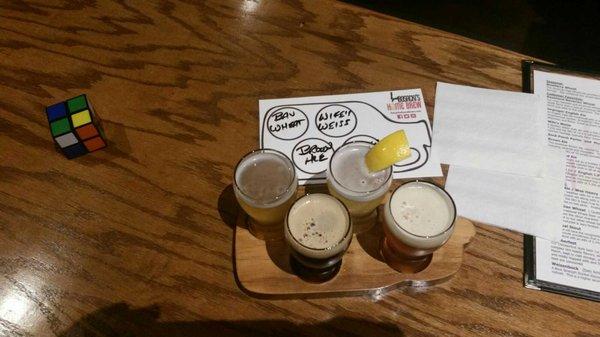 My beer flight. Btw if you get Wife's Weiss, it comes with a lemon. I thought it tasted fine without, but to each their own.