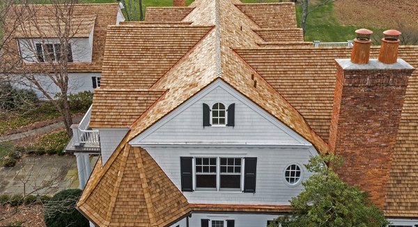 Cedar Perfection shingle roof installed by Custom Installations in Whitefish Bay, WI.