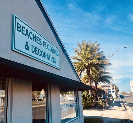 Beaches Flooring & Decorating from the outside on 3rd st.