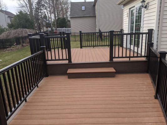 Custom two-tone deck, with timber tech decking and radiance rail express