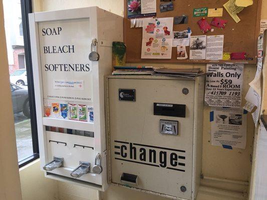 Soap dispenser, change machine, bulletin board