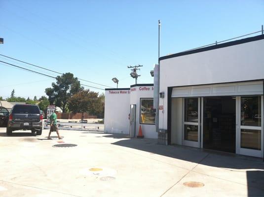 The storefront during the day.