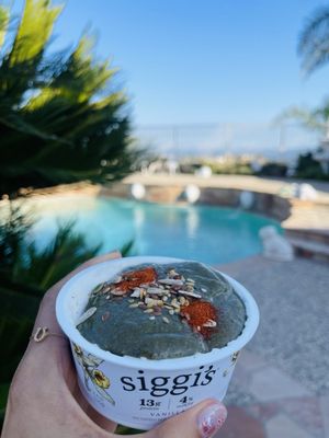 Spinach peach banana smoothie with Siggi's topped w/flax chia pumpkin sesame sunflower seeds