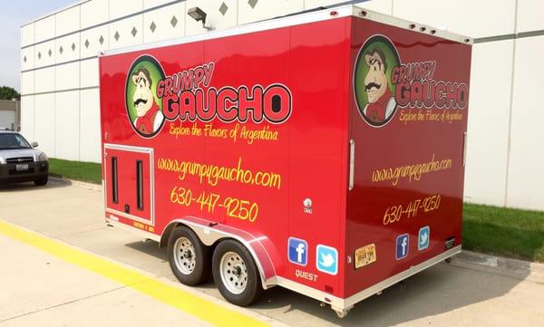 Cut and printed vinyl installed on a food service trailer by Signarama Naperville