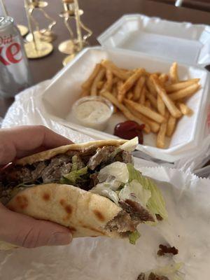 Gyro meal comes with fries and a can of soda