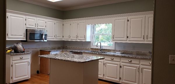 Oak cabinets painted with crown molding added!