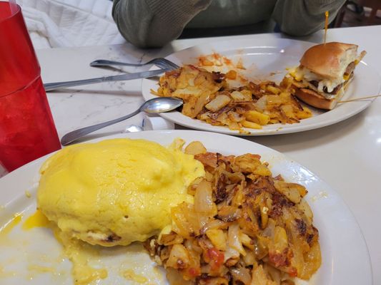 Crab Benedict and turkey sausage breakfast sandwich