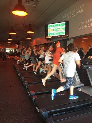 It's #FitnessFriday, and Miss Jacey is definitely in the #orangezone in that all orange outfit!