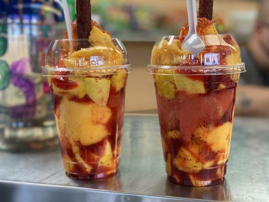 Chamango: chamoy ice cream, mango ice cream, chunks of mango, champú, Tajín chili powder, and tamarind straw.