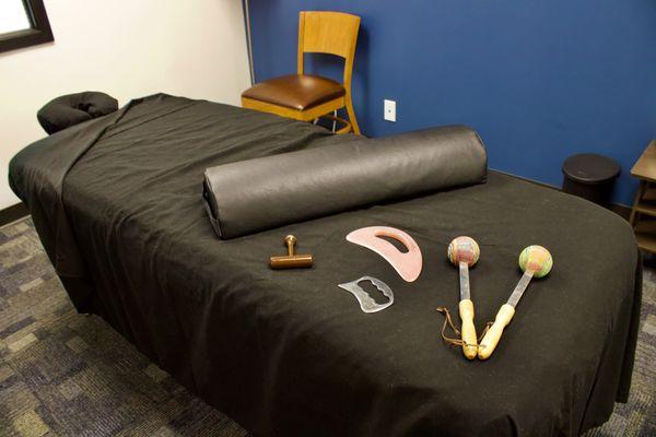 Massage Tools Listed Left to Right
 1/2 Bolster
 Trigger Point Bar (T-Bar)
 Gua Sha Small
 Gua Sha Large
 Percussion Tools