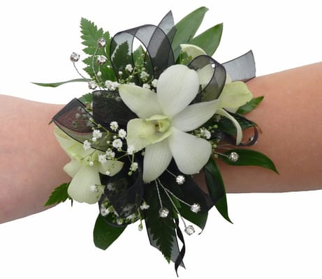 Corsages and Boutonnières are an added touch to make a special event more memorable.