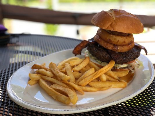 Buck Hill Signature Burger w bacon, onion rings, and maple glaze.