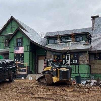 The design team at Engerman Contracting uses natural bark siding to create distinctive textures with rich earth tones.