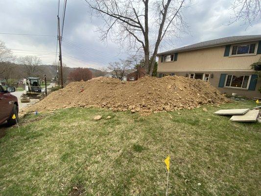 Plumber:  where should we put the clay and rocks, lets just place it on top of the home owners lawn