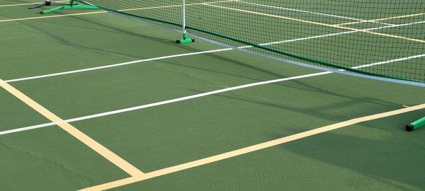 Tennis and Pickleball lines as these courts do double duty.  Lights turn on when the sun goes down.