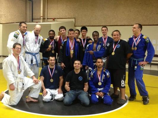 Look at all the gold medals the team took at a tournament!