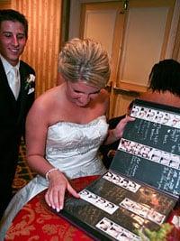 Bride looking at her album