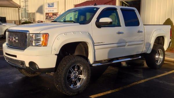 We painted and installed Bushwacker Pocket Flares on this 2009 GMC Denali 1500. Wow what a change 6" made!