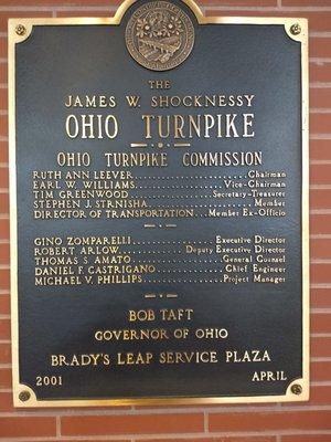 Dedication plaque inside the service plaza.