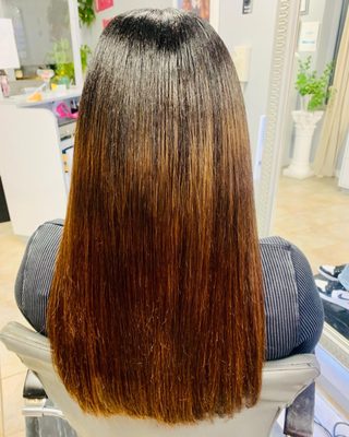 Natural silk pressed hair with color.