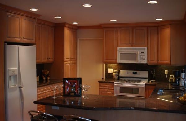 Complete kitchen remodel, cabinets, granite, lighting and flooring.