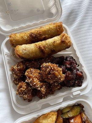 Orange Chicken and sesame chicken and egg rolls