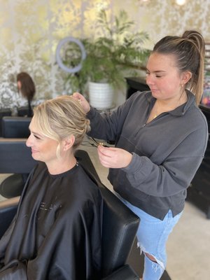 Bekah doing bridal hair and makeup.