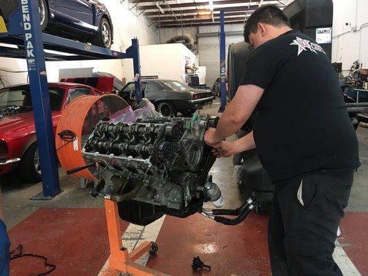 Gary tearing down a coyote motor.