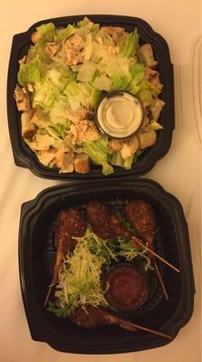 Chicken Caesar salad and coconut shrimp skewers