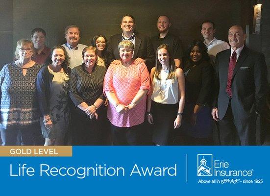 McCabe Insurance Associates located in Columbia, Maryland accepts the Gold Life Recognition Award from Erie Insurance. (410) 992-5550.