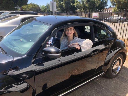 Happy daughter in her Auto Land Beetle.