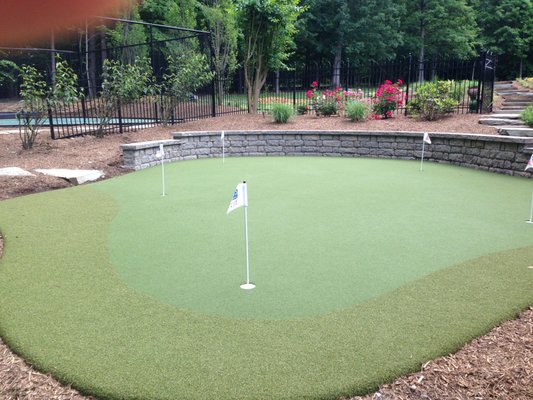 Synthetic turf putting greens