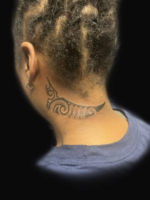 Freehand Tribal tattoo behind the Ear