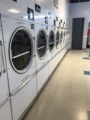 We sanitize and clean our dryers throughout the day.  Super clean and ready for your laundry