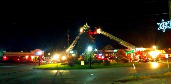 Newtown Township Fire Trucks Hanging Lights in St. Alban's Circle