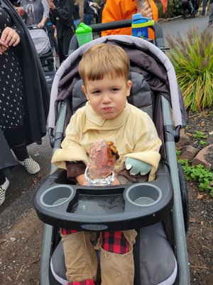 A commoner eating their  famous  TURKEY LEGS! So good!!