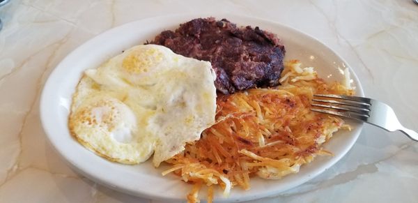 Corn beef hash, eggs, hash browns + comes with 2 pancakes