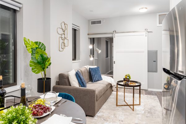 Park Heights Apartments Living Area with Sliding Barn Door