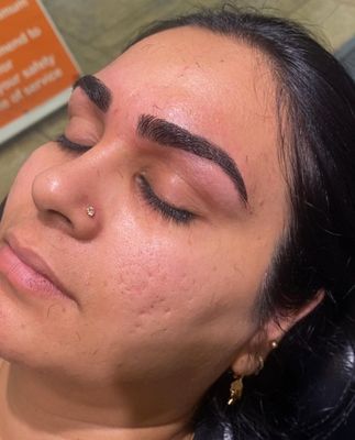 Eyebrow threading and shaping