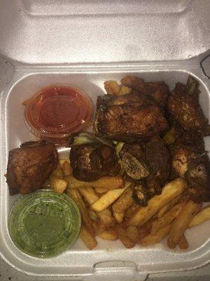 Chicharron de poll with fries  Green sauce and hot sauce