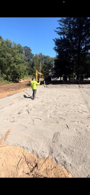 Confirming level on the top of sand for septic disposal field