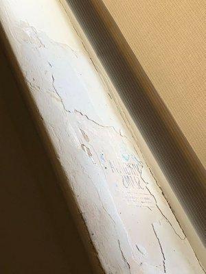 peeling window frames, you can see the lumber imprint through the paint..