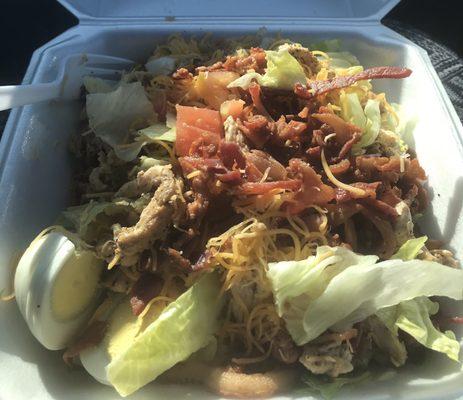 Really good ultimate Grilled chicken salad with lettuce tomato bacon pickles red onion boiled egg and shredded cheese $10